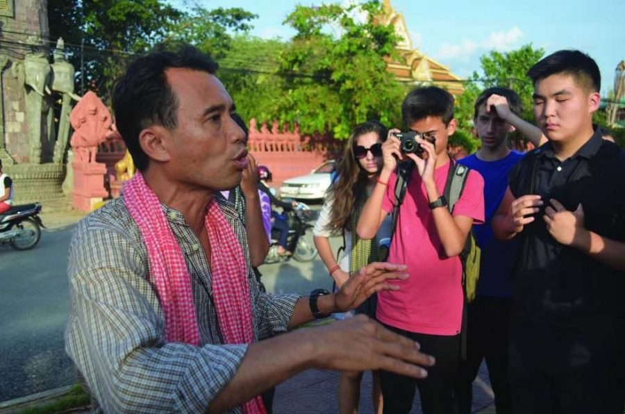 Arn Chorn-Pond shows students around Battambang, his home town. Pond is a survivor of the Cambodian genocide and a human rights activist committed to the preservation of Cambodian music. Prior to the trip, Chorn-Pond visited the Upper School on April 13 to be interviewed by students. 