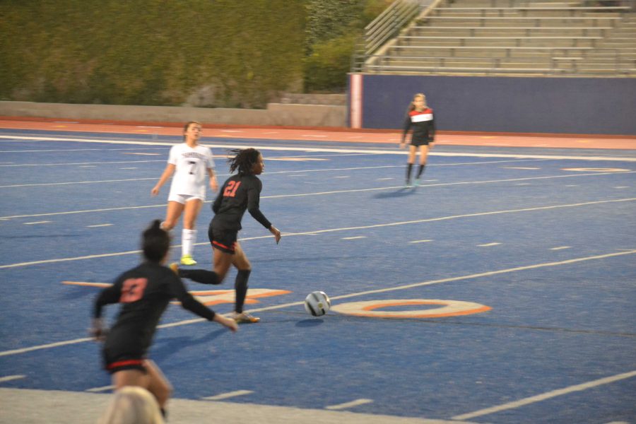 Press the advantage: Courtney Corrin dribbles the ball down the field in a match against Chaminade last year. Credit: Jonathan Seymour