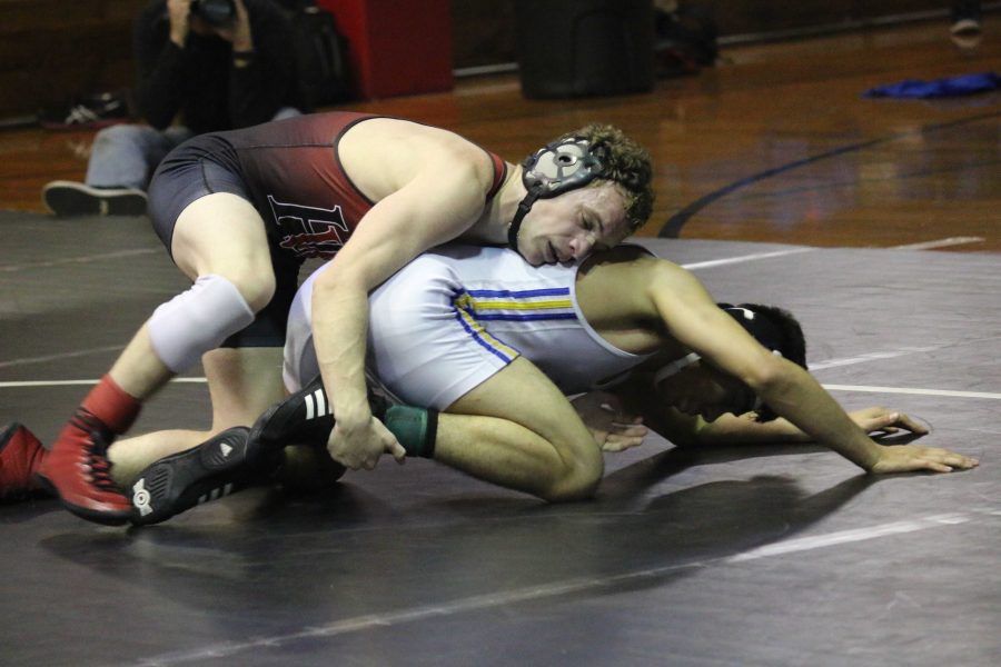 Ryan Ruiz 16 bears down on an Alemany opponent in the Wolverines 69-5 loss on Jan. 13.  Credit: Pavan Tauh/ Chronicle
