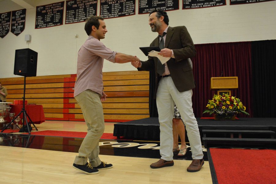 Javi+Arango+16+accepts+his+senior+academic+award+in+English+from+English+Department+Head+Larry+Weber.+Credit%3A+Teresa+Suh%2FChronicle