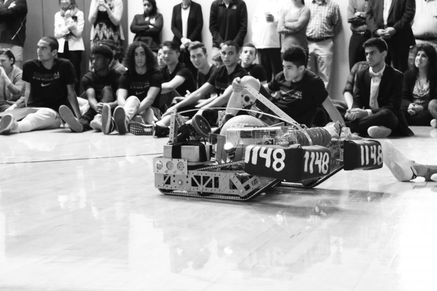 HW Robotics Teams robot, 1148, makes an appearance at the final 1st and 3rd Wednesday Assembly to encourage students to join the robotics team.