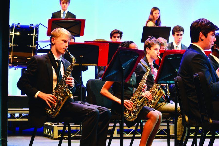 Jacob Frank ’17 plays the saxophone with the Upper School Symphony during its Nov. 18 performance. The 
symphony performed compositions by Bela Bartok, Antonin Dvorak and other composers in their Fall Instrumental Music Concert. Credit: Pavan Tauh/Chronicle