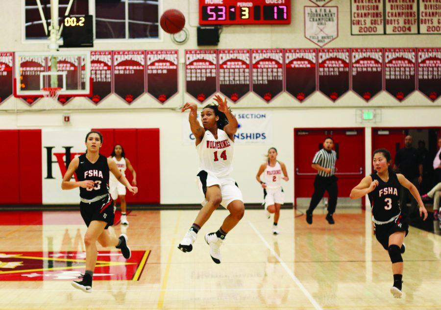Jayla Rufus-Milner ’18 fires off a buzzer-beater during the team’s 59-24 victory over FSHA on Jan. 5.  The team is 14-1 and ranked 17th in the nation as of press time.  It will play against Alemany, the state’s 15th-ranked team, on Jan. 19. Credit: Pavan Tauh/Chronicle