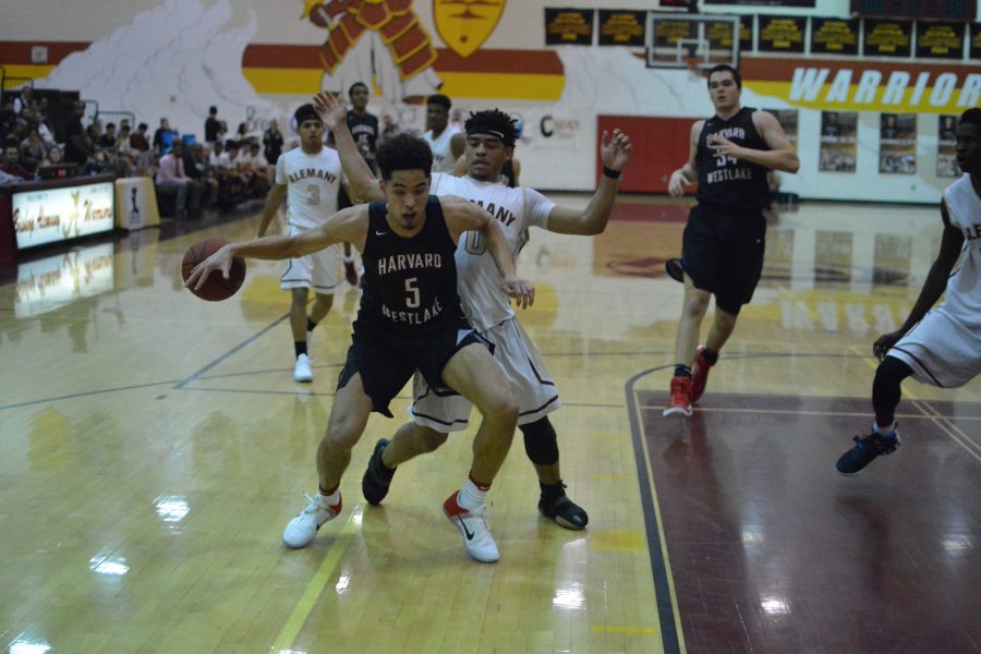 Guard Johnny Juzang 20 loses the ball during the Wolverines loss to Alemany Nov. 9.  Juzang finished the game with a team high 18 points.  Credit: Aaron Park/Chronicle