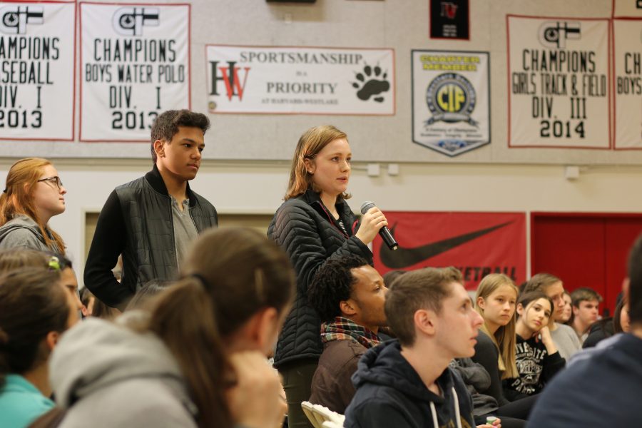 Liz Yount 17 asks Bakari Sellers a question as Connor Engel 17 listens. Credit: Pavan Tauh/Chronicle