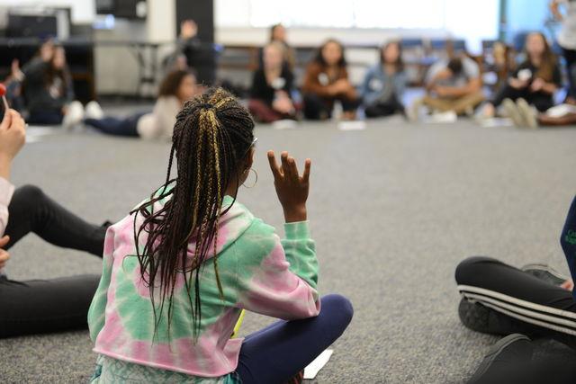Student poses a question during a workshop at the Across Colors Diversity Conference. Credit: Jenny Li/Chronicle