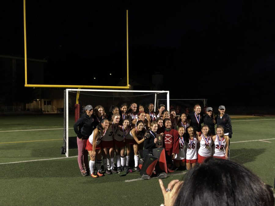 After+a+perfect+season%2C+the+girls+field+hockey+team+poses+after+defeating+Newport+on+Saturday.+Photo+Credit%3B+Lucas+Gelford%2FChronicle