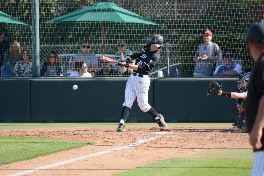 Center+fielder+RJ+Schreck+%E2%80%9918+hits+the+ball+in+the+second+league+game+against+Chaminade.+Photo+Credit%3A+Ryan+Albert%2FChronicle