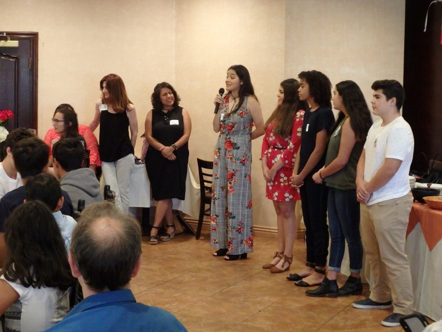 Xenia Bernal 19 speaks alongside fellow LAHSO members in front of faculty, students and parents about unifying as a community. Credit: Tammer Bagdasarian/Chronicle