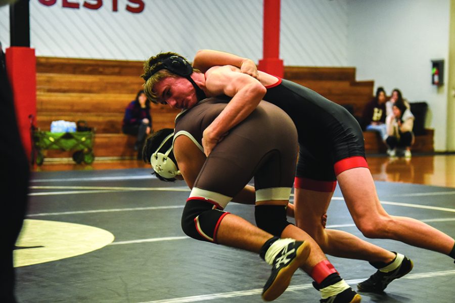 SURF-BOARDMAN: Paul Boardman ’21 grapples with an opponent from Crespi Carmelite High
School. Boardman advanced to the CIF Southern Section Championships in individuals this year.
Photo Credit: Zack Schwartz/Chronicle
