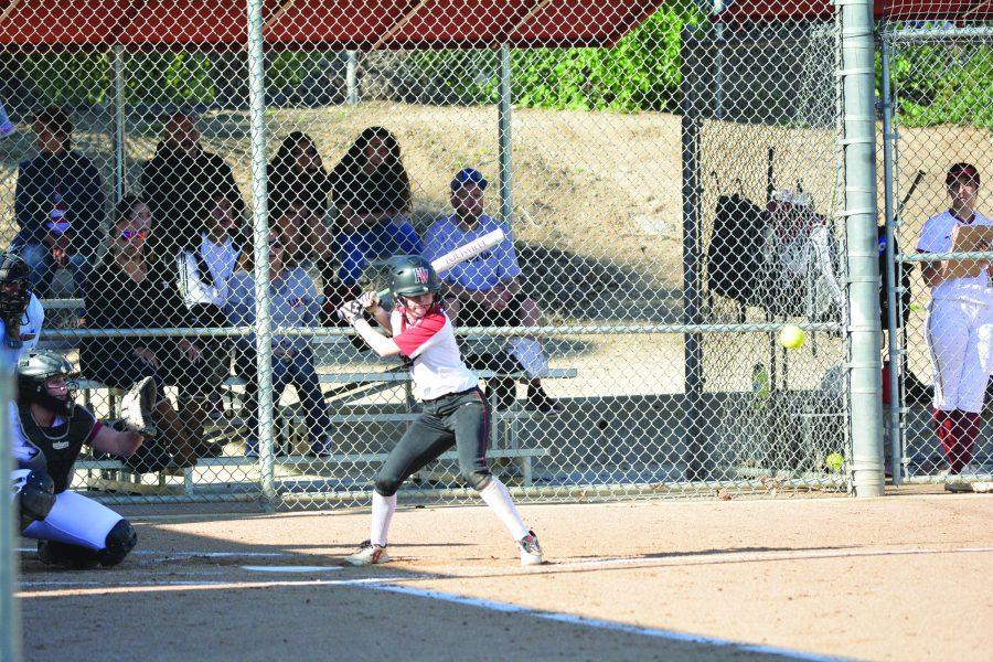 KAT IN THE SOFTBALL HAT: Shortstop Kat Swander ’19 prepares to hit in the 7-0 loss against Alemany High School on March 12. The squad is currently 1-1 against Alemany this season, beating the Warriors for the first time April 17 in its second matchup.
Credit: Jay Lassiter/Chronicle