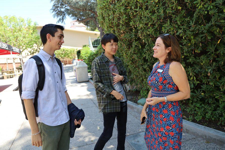QUAD TALK: Head of Upper School Laura Ross talks with Michael Lehrhoff ’20 and Justin Park ’20 on the quad. Ross will assume her new position in just under a year.  In the meantime, Debbie Reed will serve as the Interim Associate Head of School.