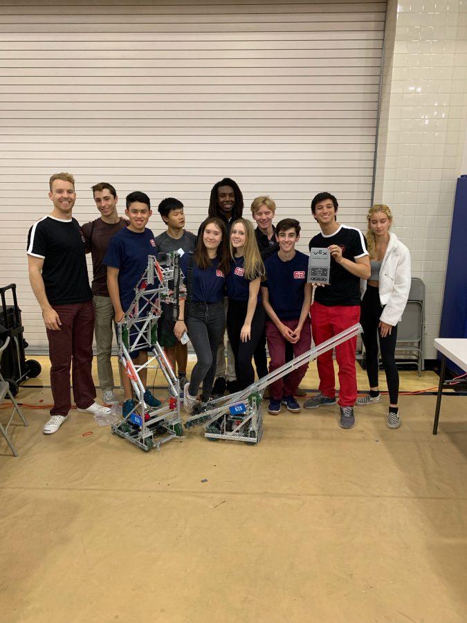 Subteams+62A+and+62X+pose+for+a+photo+with+their+two+robots+at+Arnold+Beckman+High+School+on+Sept.+21.+Subteam+62X+received+the+Design+Award%2C+setting+the+record+for+the+quickest+qualification+for+the+VEX+California+State+Championship.+Credit%3A+Published+with+permission+of+Katie+Mumford