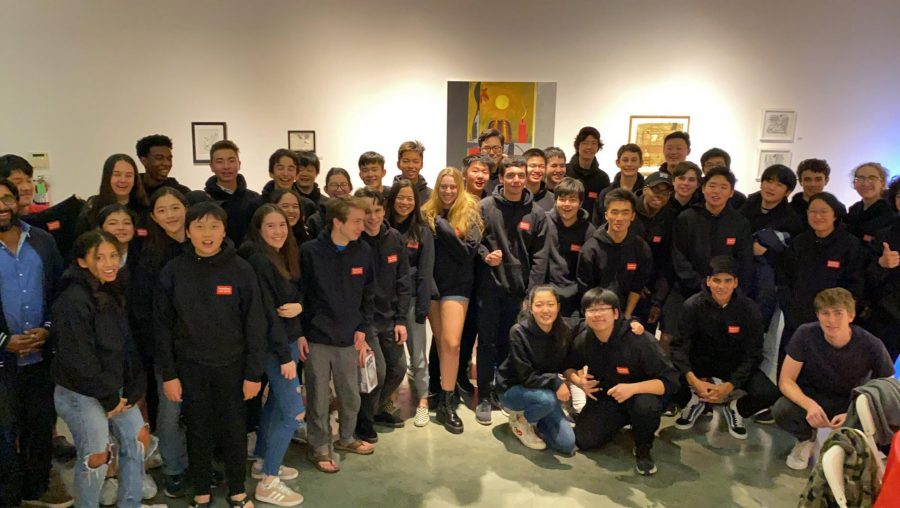Middle and Upper school students group together for a photo in their Hackathon sweatshirts. Credit: Jacky Zhang 