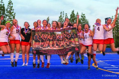 The team celebrates after winning their third consecutive Los Angeles Field Hockey Association Title in a row. Credit: David Moriarty