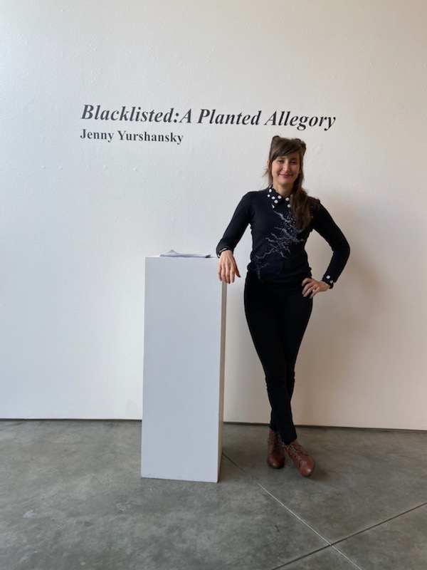 Mixed media artist Jenny Yurshansky opens her art exhibition, Blacklisted: A Planted Allegory, to students and faculty during her opening reception in Feldman-Horn Gallery on Jan. 10. Credit: Crystal Baik/Chronicle