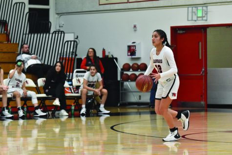 Una(Paula)getic: Guard Paula Gonzalez ’21 surveys the frontcourt in a 75-31 win at home against La Cañada High School on Dec. 4 in the Brentwood Invitational. The Wolverines went on to win the Mission League title after finishing with a 7-1 league record.   