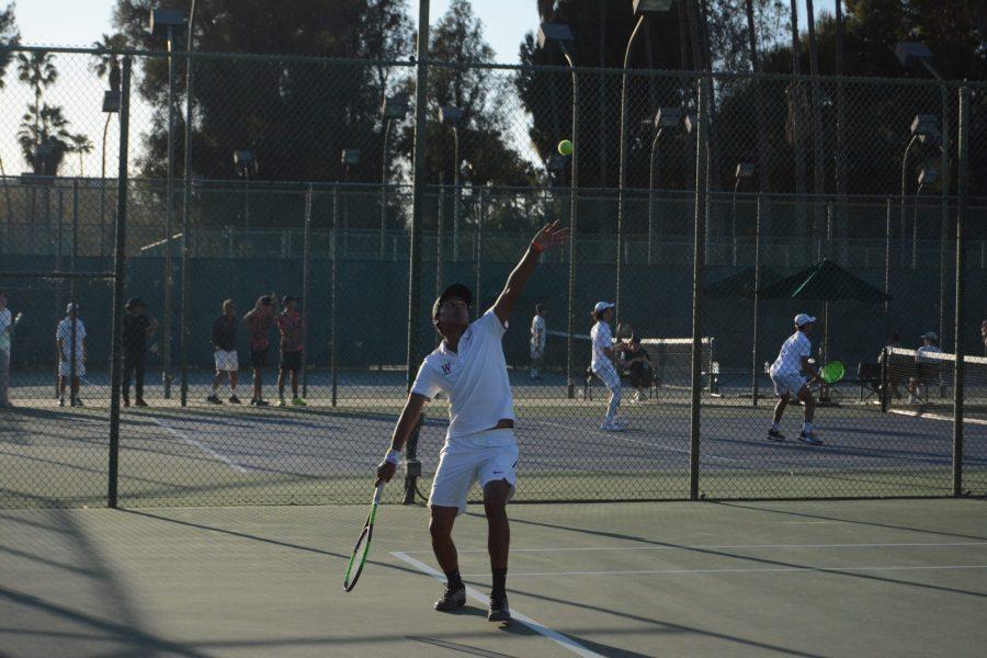 Pat+Otero+21+prepares+to+serve+the+ball+in+a+15-3+win+at+home+against+Palos+Verdes+High+School+on+Mar.+3.+Otero+won+all+three+of+his+matches+against+the+Sea+Kings.+