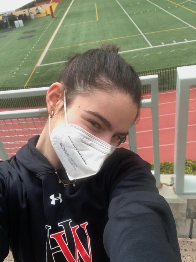 Natalie Cosgrove 23 poses for a selfie by Ted Slavin Field.