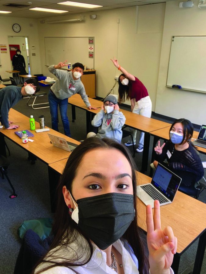 Fallon Dern 23 takes a selfie with the other sophomores in her cohort in the Chalmers classroom they were assigned to.