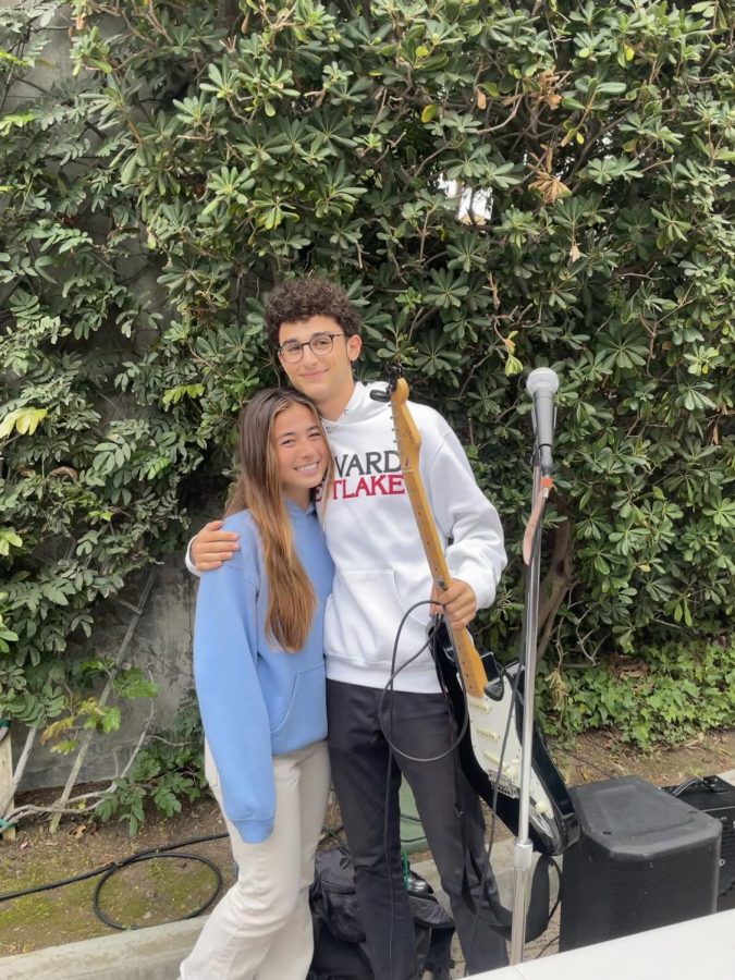 Gabe Yaron ’22 and Bella Ganocy ’22 embrace after Yarons parody performance of The Few Things by JP Saxe asking Ganocy to Homecoming.