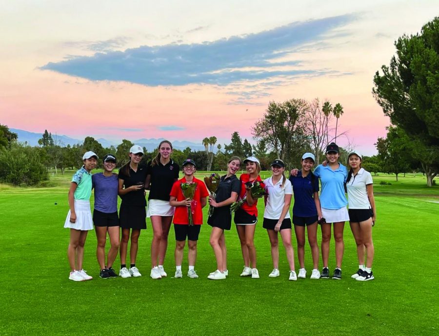 SENIOR FESTIVITIES: On Senior Night the team gathered on the golf course to celebrate is season. Captains Alexa Sen 22, Marine Degryse 22 and Sports Section Editor Maxine Zuriff 22 were gifted roses as a tradition.