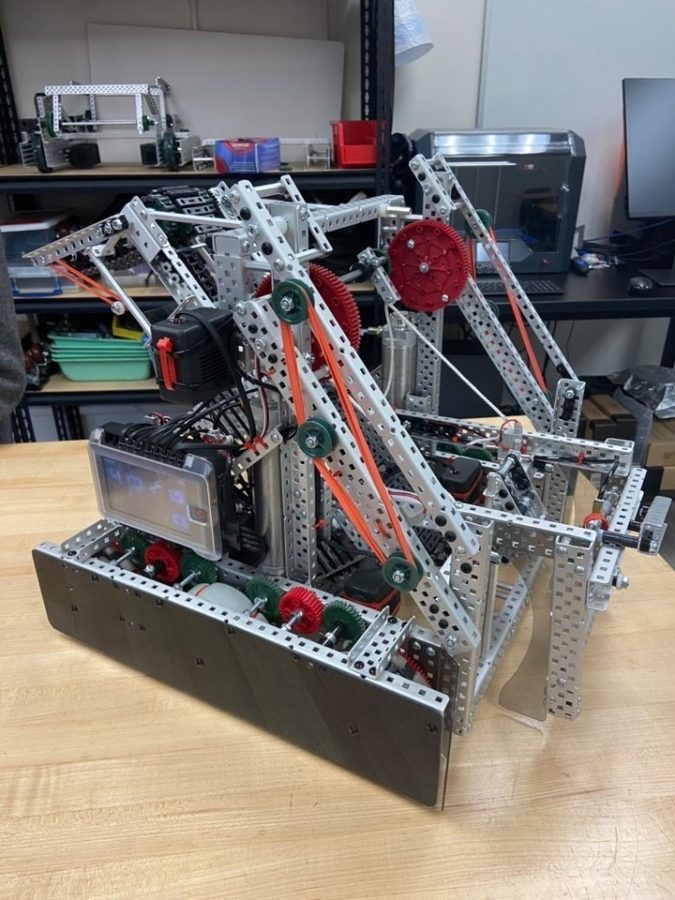 In preparation for upcoming tournaments, robotics team 62A works on their robot. The robot has lifts that are used to pick up mobile goals, an important element of robotics competitions.