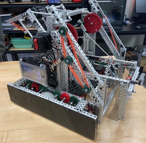 In preparation for upcoming tournaments, robotics team 62A works on their robot. The robot has lifts that are used to pick up mobile goals, an important element of robotics competitions.