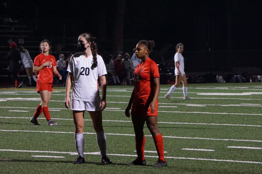 On Ted Slavin Field, forward Victoria Pugh 25 lines up with a defender and prepares for a goal kick in a game against Flintridge Sacred Heart Academy on Jan. 19.