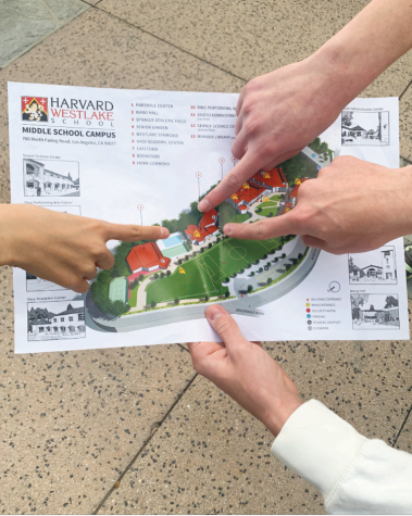 Student Ambassadors examine the middle school campus map that the school’s Admissions Office offers to prospective families. The map features all academic centers and common areas.