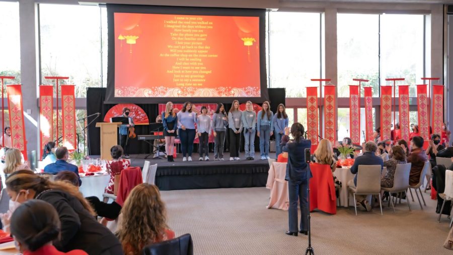 Nathalie Paniagua 23, Olivia Baradaran 24, Jordan Dees 24 and more perform a song at the Chinese New Year Luncheon. Printed with permission of Doug Sun.