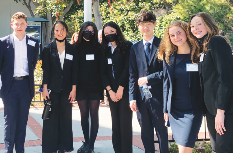 Model United Nations (MUN) students pose in their formal attire while in a break at their conference at Marymount High School. Several delegates from the school secured awards at the end of the conference.