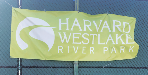 A sign advertising the school’s River Park plan to replace Weddington Golf & Tennis is posted on a tennis court fence next to the Weddington parking lot. The River Park plan came closer to completion when the City of Los Angeles released its draft environmental impact report (DEIR). 