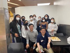 Chinese II students and faculty chaperones pose next to food samples they tried during their field trip to 99 Ranch Market.