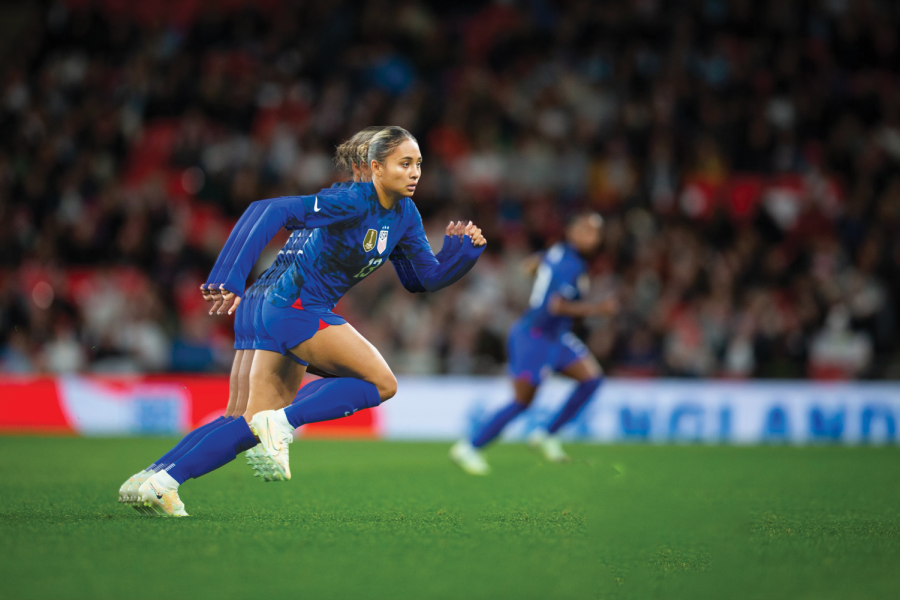 A photo illustration depicts Alyssa Thompson 23 as she runs on the field with the U.S. Womens National Team. 