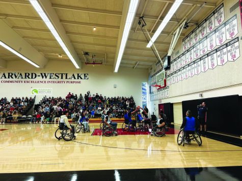 MORE THAN A GAME: Students participate in the annual Community Service Week during a session of wheelchair basketball in Taper Gym. The game was part of a visit from Angel City Sports, which aims to familiarize students with athletic activities for the disabled community.