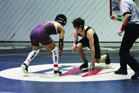 On the Mat: Alec Avedissian 25 faces off against an opponent in a wrestling match versus Crespi Carmelite High School on Jan. 31, 2023, the teams fourth match of the season and final one before Mission League Finals.