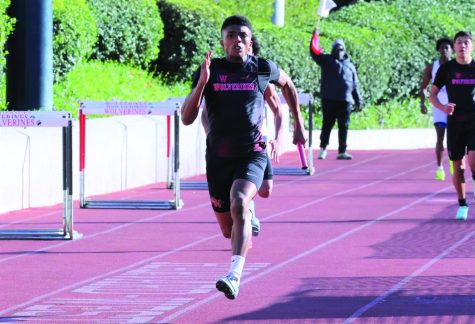 DEAD sprint: Aaron Milburn ’24 competes in the 4x100-meter relay at the track and field team’s first meet of the season. The team won 90-28 at home against Sierra Canyon High School. The team’s next meet will be against Notre Dame, a league opponent, on March 23.