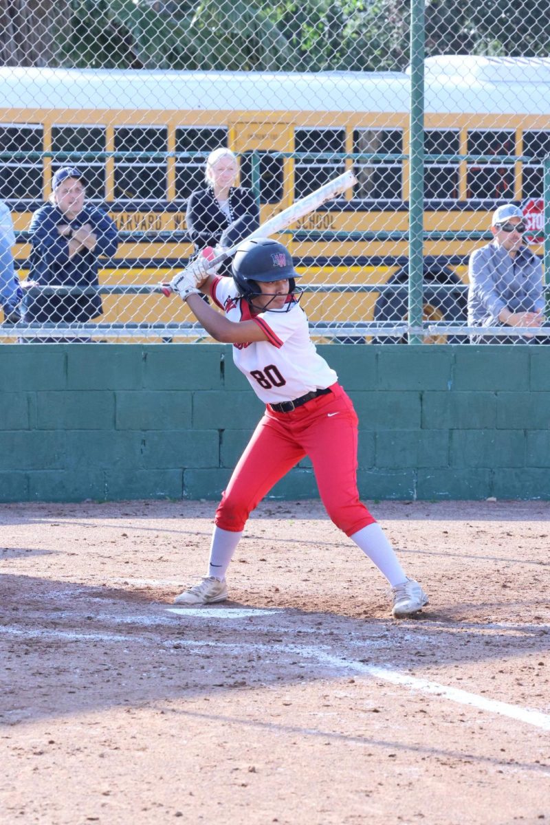 Swing, Batter: Morgan Hill ’26 takes a swing at the ball during a home game against La Salle High School on Feb. 21. The team won 10-0.