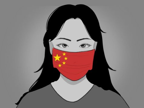 A Chinese girl wears a COVID-19 mask that represents the Chinese flag. 