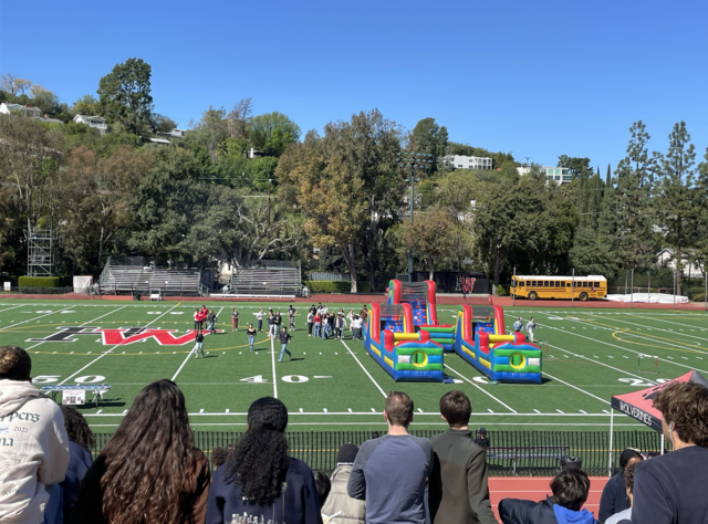 Students gather on Ted Slavin field for Field Day. 