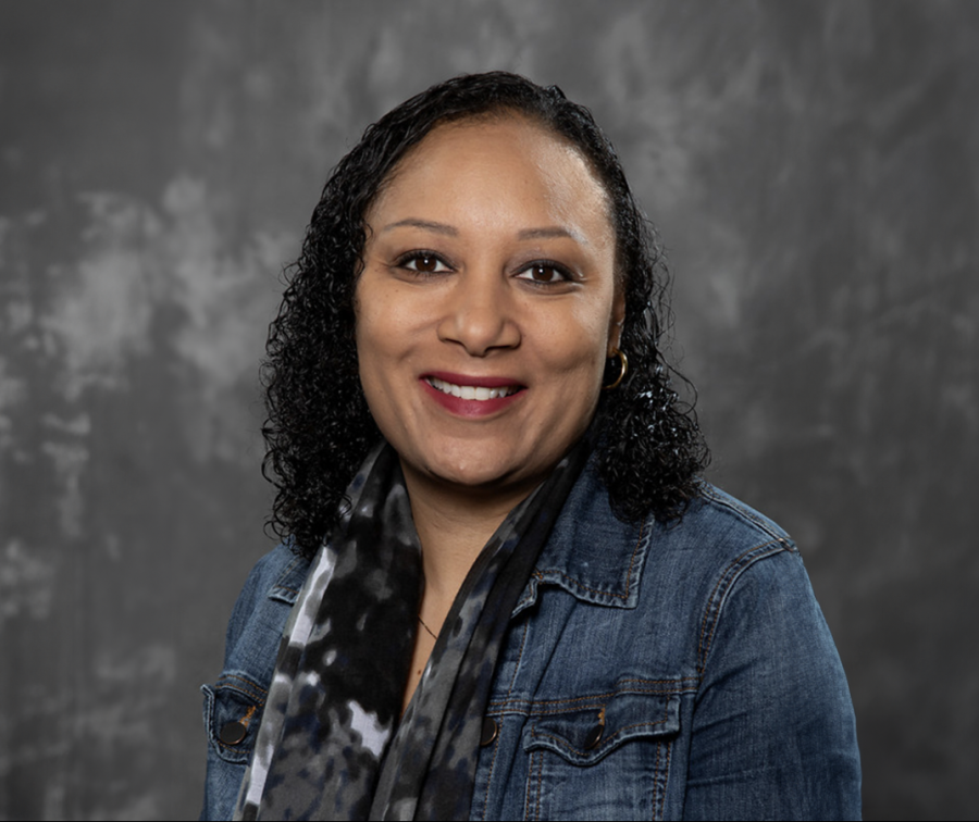 Head of Diversity, Equity and Inclusion (DEI) and Associate Director of Admission Janine Jones poses for her yearbook portrait during the 2022-2023 school year. 