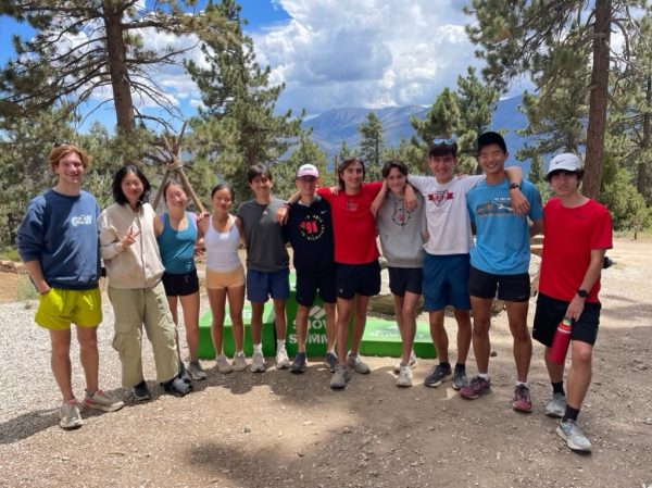 HIGH ALTITUDE: Members of the boys and girls cross country team 
pose together for a team picture out in the wilderness of Big Bear Lake.