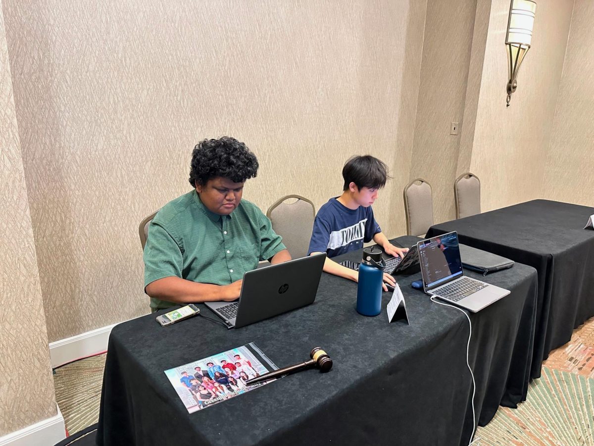 LOCKED IN: Assistant Opinion Editor William Liu ’25 and Assistant Debate Coach Jonathan Meza prepare for the final round of the round robin tournament. The team travelled to Dallas,Texas over the weekend.