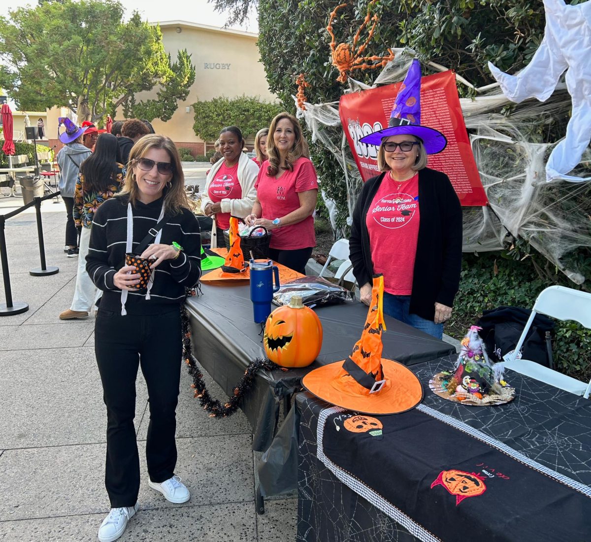 HWPA stands at the senior appreciation booth on the Quad on Oct. 30. The parents organized a Halloween themed appreciation day with snacks and gifts.