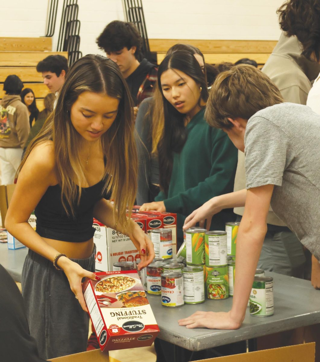 Students helped pack kits for the LA Food Bank on Nov. 8. Community Council planned service events throughout the week.