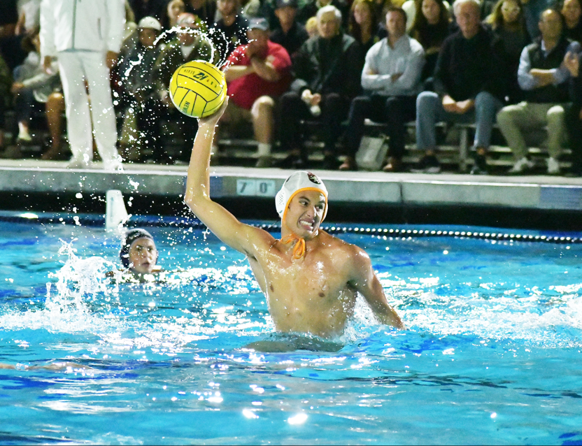 Attacker+Alex+Heenan+24+legs+up+on+a+five-meter+penalty+shot+against+Newport+Harbor+in+the+CIF+semifinal+Nov.+8.