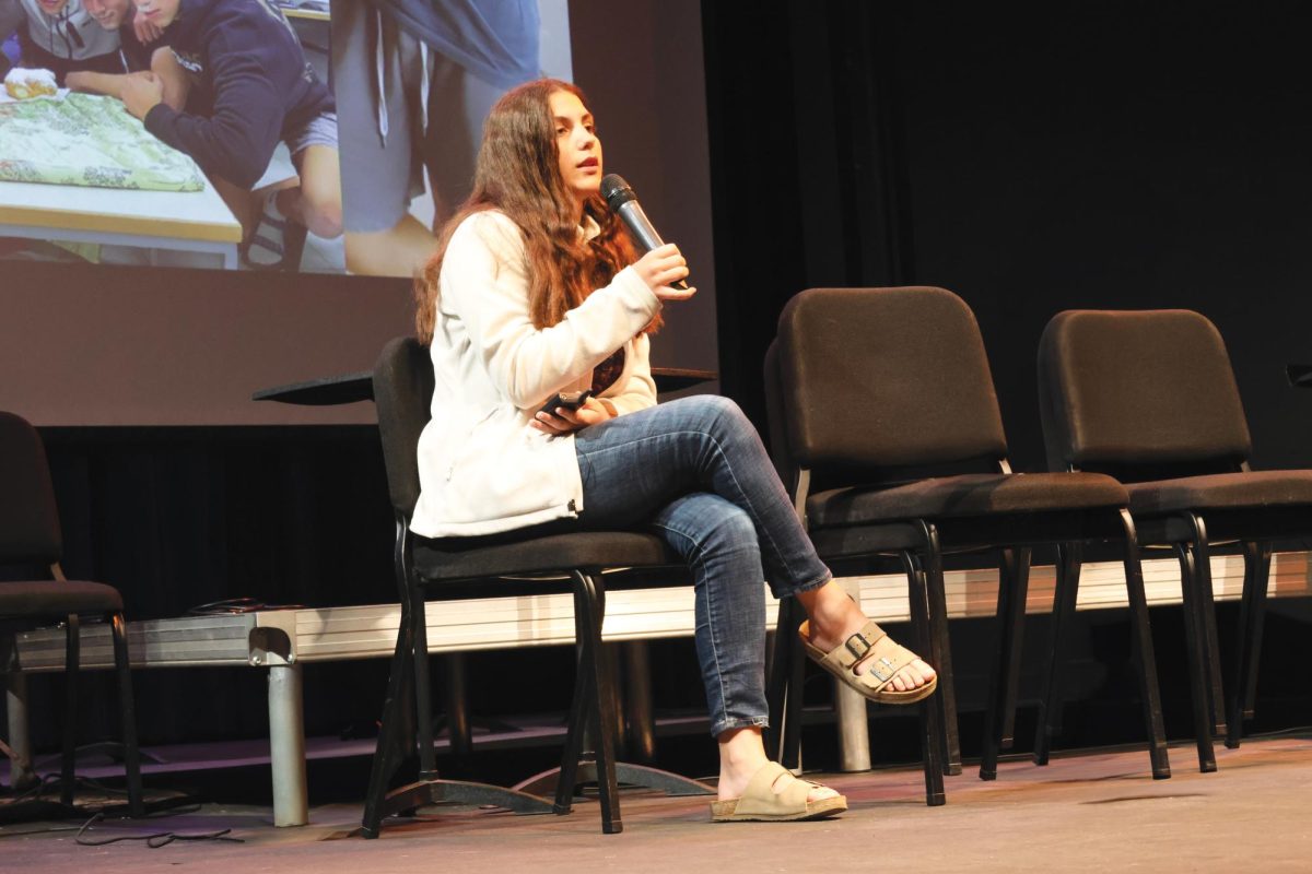 14-year-old Ella Shani presents to students and faculty Nov. 29. She recounted the day of Oct. 7. when Hamas militants invaded her kibbutz, killing over 100 residents and taking several hostage back to Gaza.
