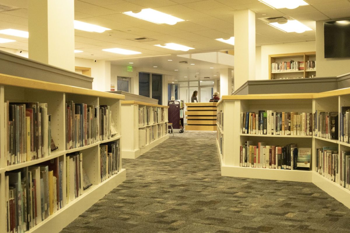 New bookshelves run along the east wing of Mudd Library. The building was formally opened to students after winter break following a renovation project that took roughly six months.