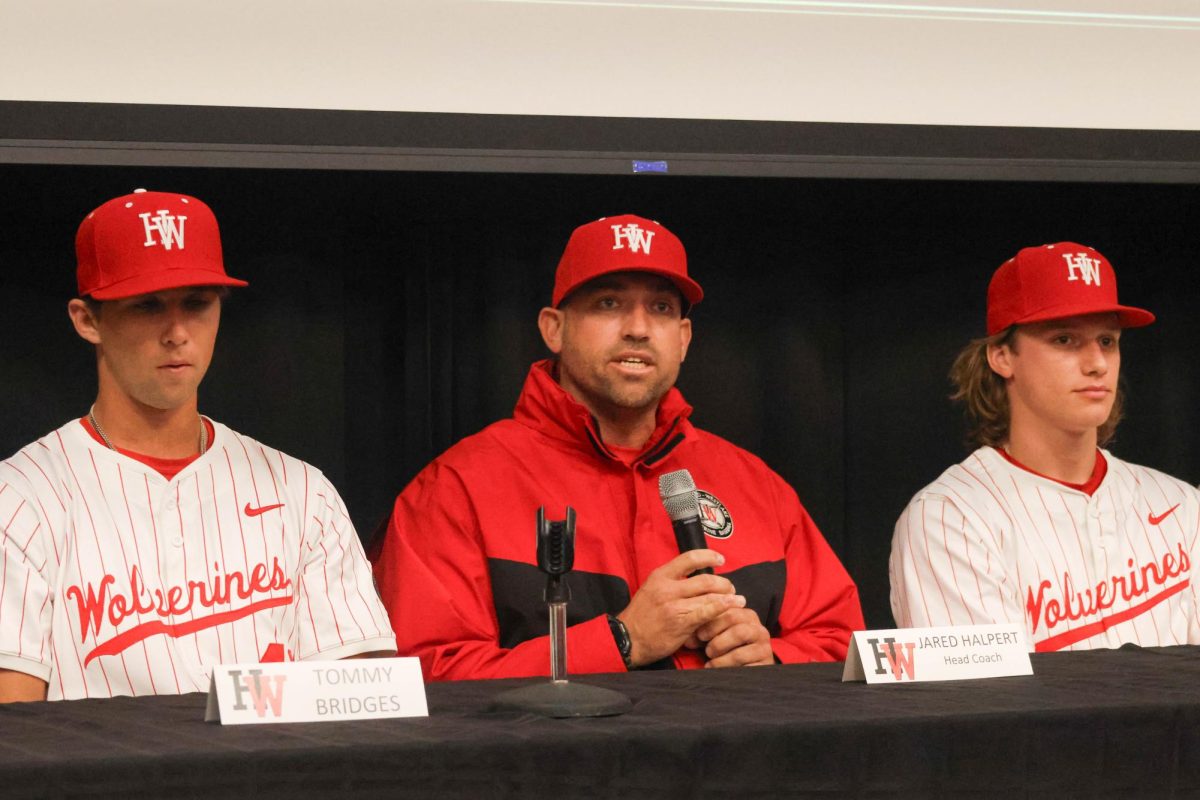 Baseball Program Head Jared Halpert, alongside seniors Tommy Bridges 24 and Duncan Marsten 24, addresses a reporters question at the Mission League Media Day on Jan. 31. Reporters were able to ask questions to all Mission League coaches and players who were present.